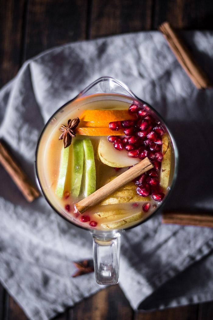 I love a non-alcoholic festive sangria, especially when it tastes like winter with all its beautiful mixed fruits and christmas spices. It’s the easiest thing in the world to do and you can prepare it ahead of time.