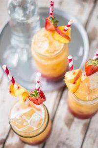 Delightful spring mocktail - roasted peach and strawberry fizz!