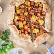 The sweetest most delicious tomato galette honoring the season of homegrown tomatoes.
