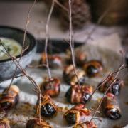 Indulgent finger food for the best party you'll ever throw, but not without these crispy bacon wrapped prunes and a decadent herbed feta dip!