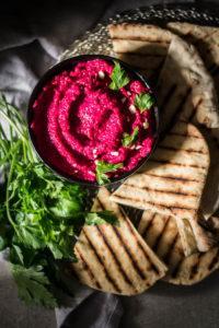 Unsurprisingly, the hero of this luscious creamy beet dip is beetroot, but there's a little something else in that makes it even sweeter and tastier. And above all a very simple buckwheat fladbread with herbs.