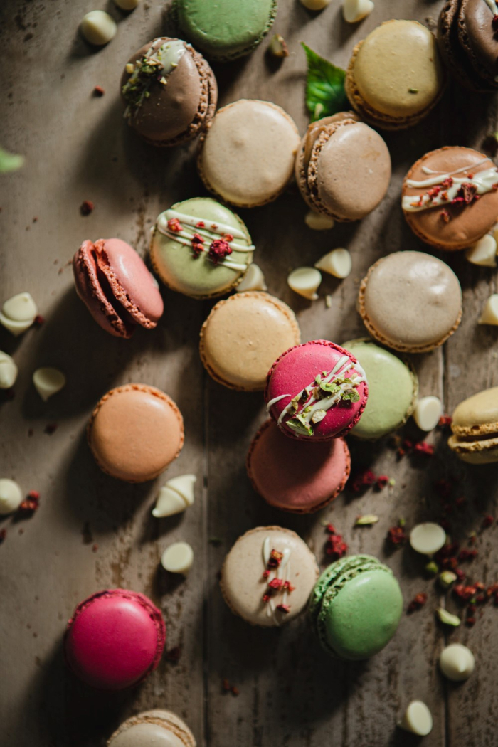 Colorful macrons on a wooden table