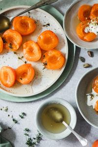 A light Summer dessert with ton of flavor - honey poached apricots. This soft and tender desserts melts in your mouth.