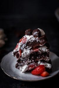 This strawberry chocolate cake with honey macerated strawberries and chocolate rhubarb truffles is perfect for any celebration and is super easy to make and so yummy.
