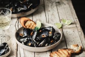 This mussels recipe is the easiest and super delicious! With just a few simple ingredients you get maximum flavors. Wine, garlic, and parsley make the most delicious sauce.