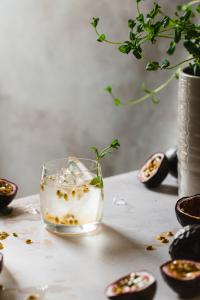 Fresh passion fruit and delicious floral elderflower syrup give this refreshing elderflower and passion fruit gin and tonic recipe a sweet valentine's day twist.