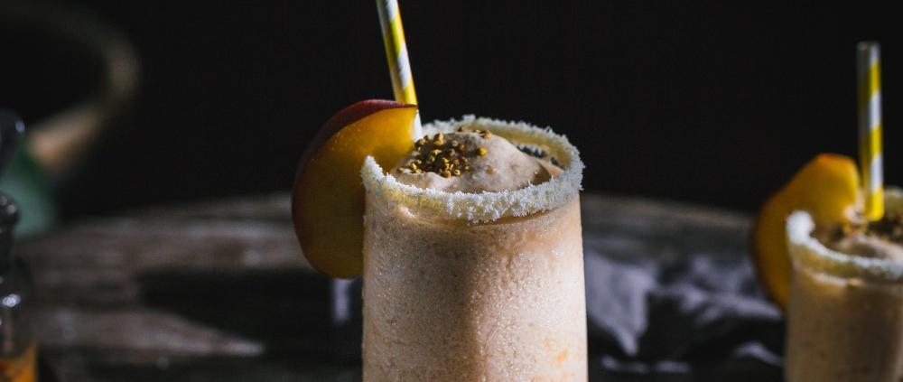 This roasted peach coconut slushie is so fresh, and easy! This icy blend of sweet peaches and coconut cream is perfect summer treat.