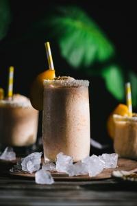 This roasted peach coconut slushie is so fresh, and easy! This icy blend of sweet peaches and coconut cream is perfect summer treat.