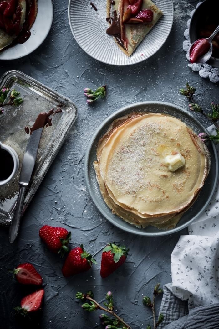 These roasted strawberry rhubarb crêpes with homemade chocolate and hazelnut spread are the perfect way to celebrate spring. 