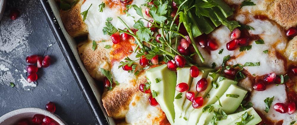 These shredded chicken enchiladas are my absolutely favorite enciladas. The recipe is super easy and it even includes a homemade enchilada sauce that's made with little effort in only 15 minutes.