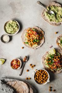 The best homemade chickpea tacos - filled with a creamy avocado spread, spicy roasted chickpeas and a vibrant fresh pineapple salsa.