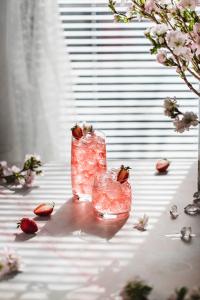 Learn this easy recipe for a fruity strawberry gin and tonic with homemade strawberry simple syrup. Only a few simple ingredients but so much flavor!