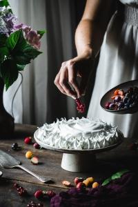 The best Summer berry pavlova is when fresh summer berries meet a crisp and chewy meringue and some fresh whipped cream.