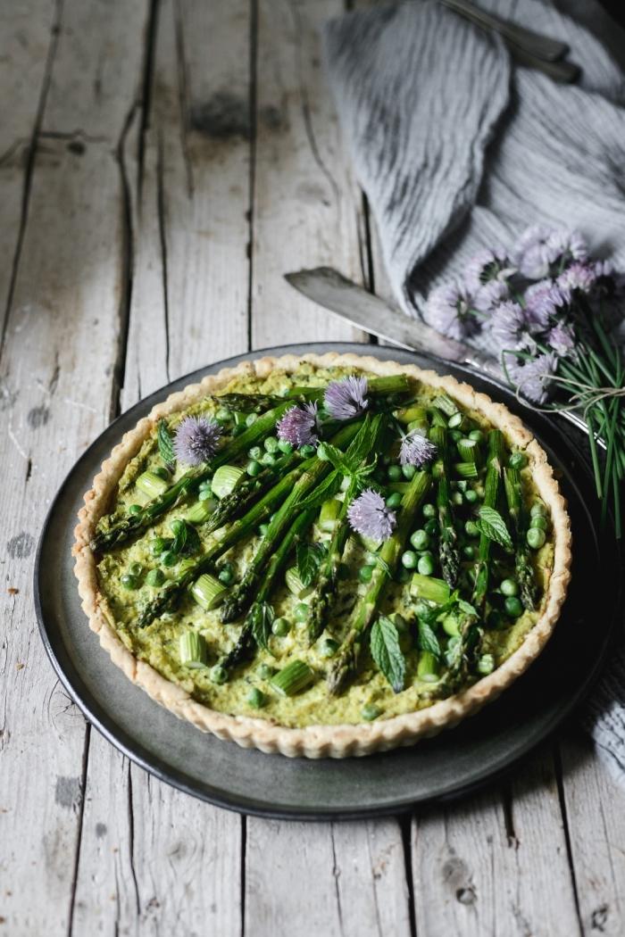 This simple vegan pea and asparagus quiche recipe is so easy to make and a great way to treat your guests!